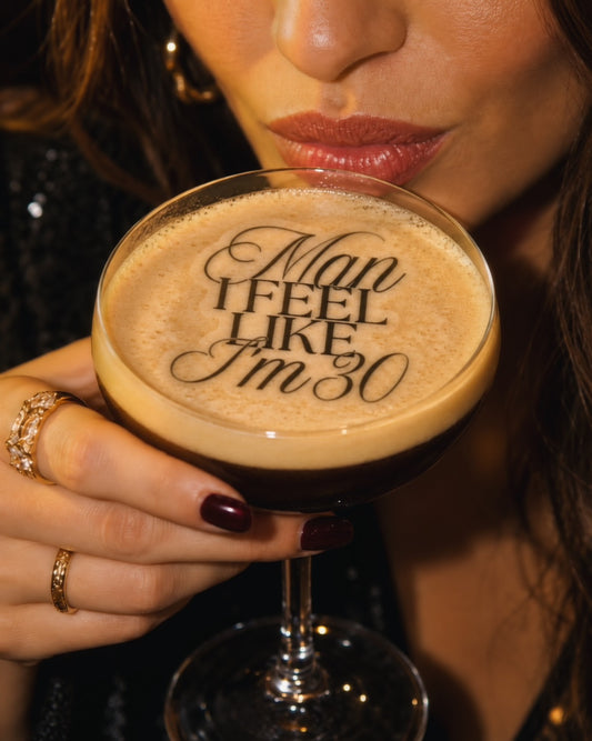 Man I Feel Like I'm Thirty edible cocktail toppers on espresso martinis